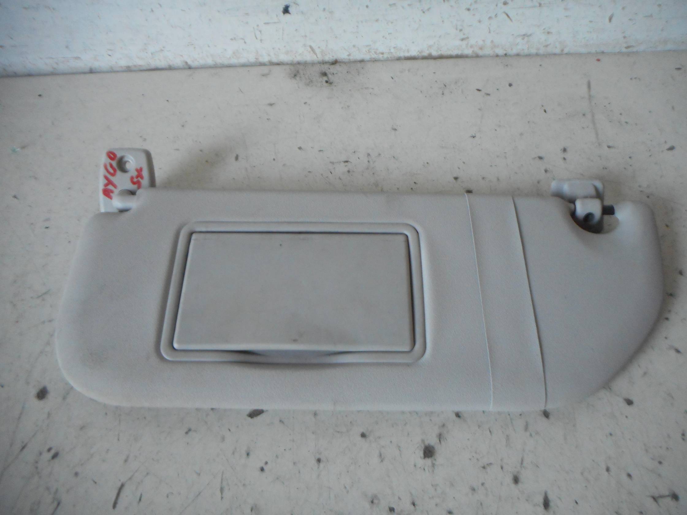 Aletta parasole parabrezza sx.